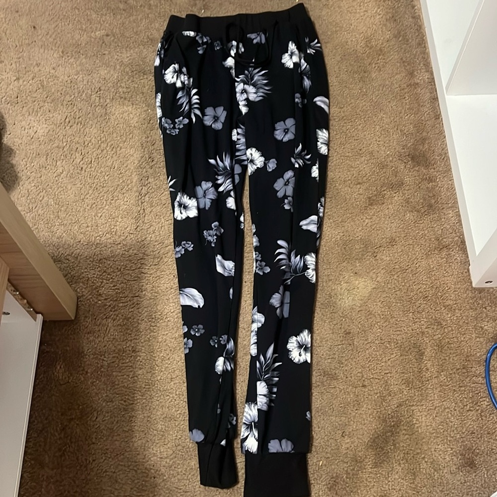 Black joggers with flowers